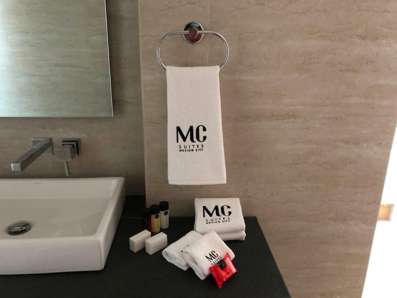 Mc Suites Mexico City Exterior photo A towel ring with a towel