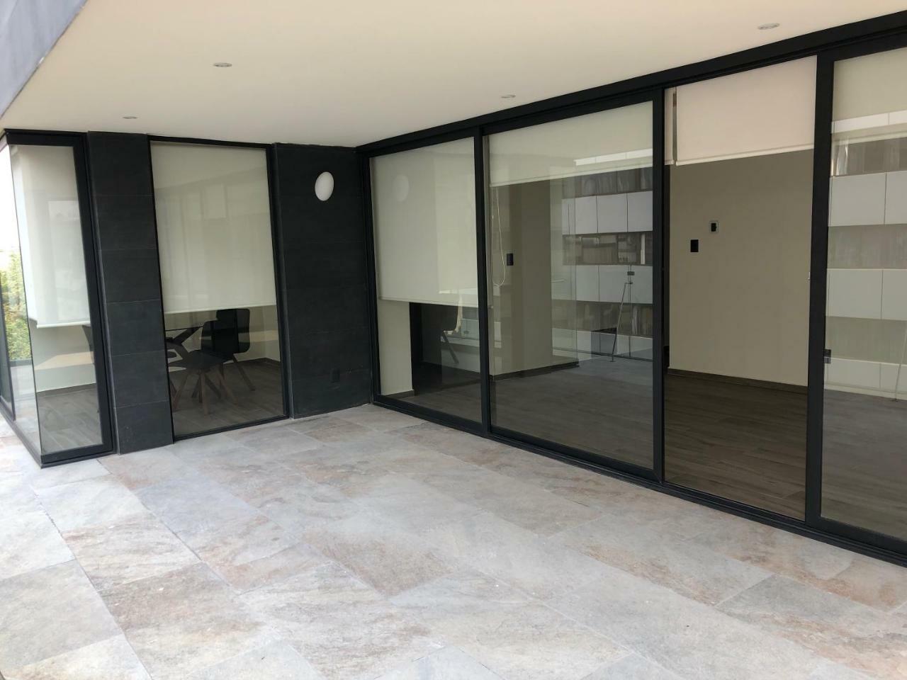 Mc Suites Mexico City Exterior photo A glass sliding door