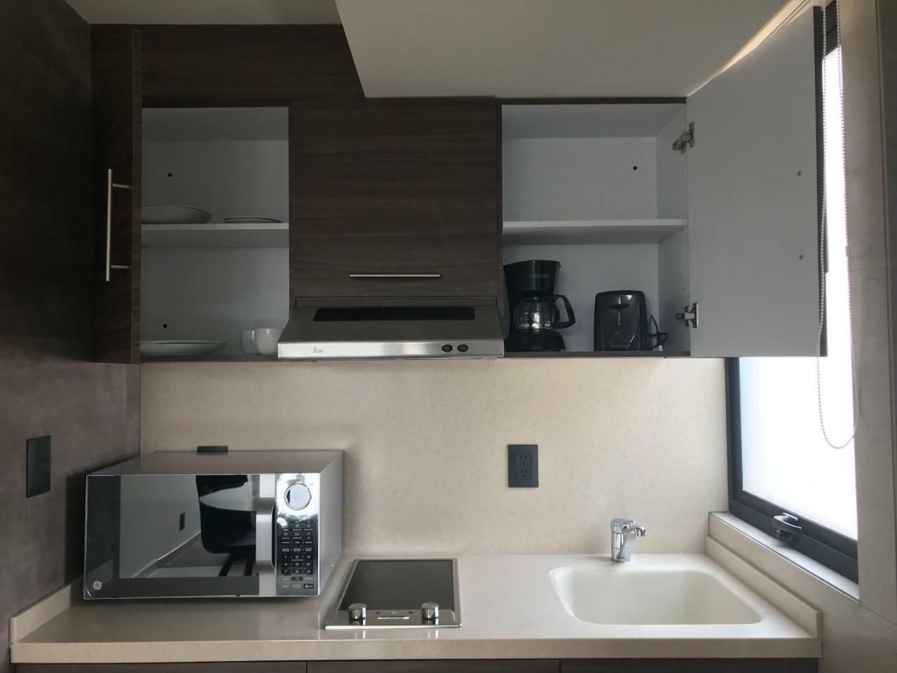 Mc Suites Mexico City Exterior photo A kitchenette in a hotel